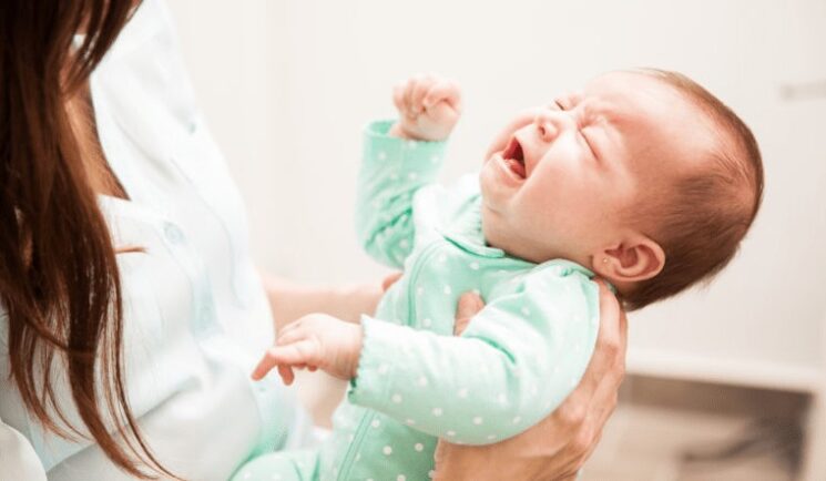 how to help a baby with reflux sleep at night