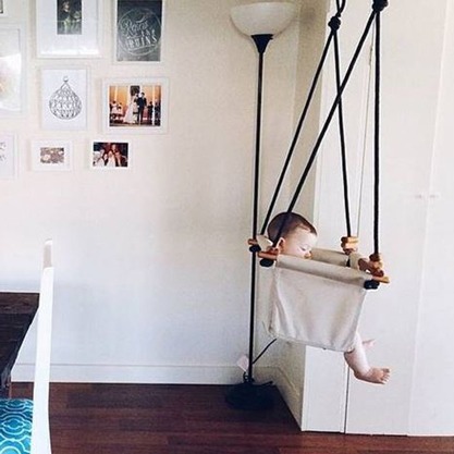 When should a baby stop using a swing?
